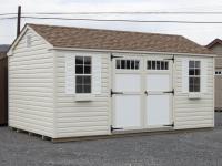 10x16 Peak Style Storage Shed with Vinyl Siding at Pine Creek Structures of Spring Glen