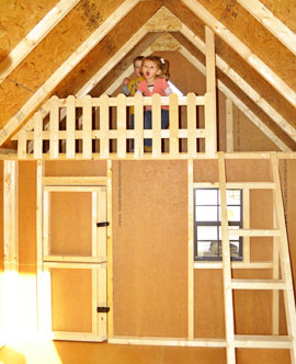 Loft inside a clubhouse playhouse from Pine Creek Structures